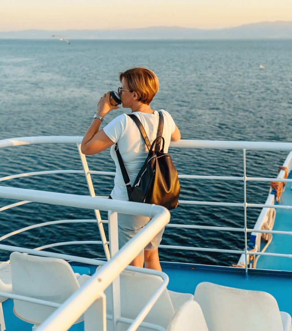 Traveler enjoying ocean view on deck