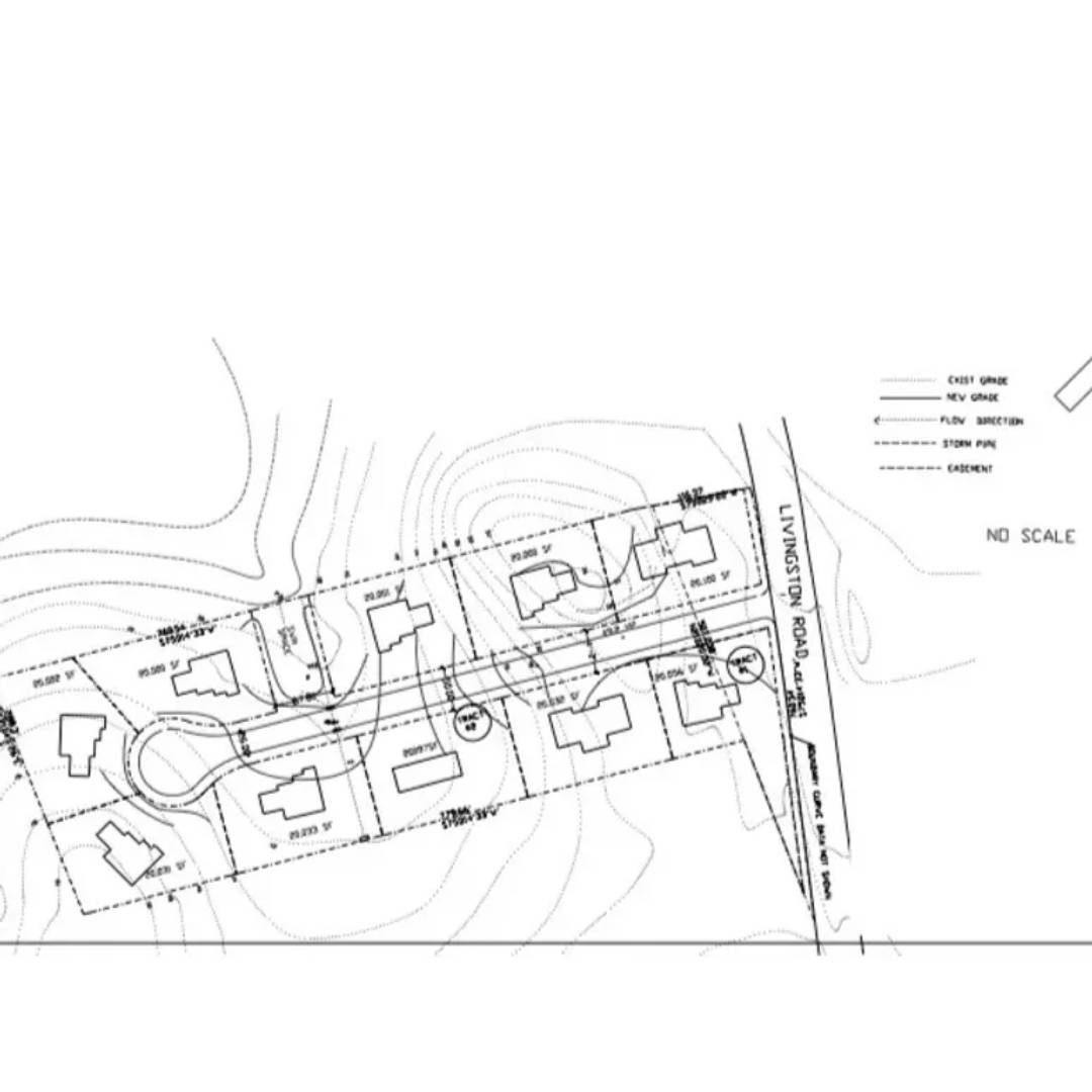 Site plan showing layout of multiple residential buildings and roads.