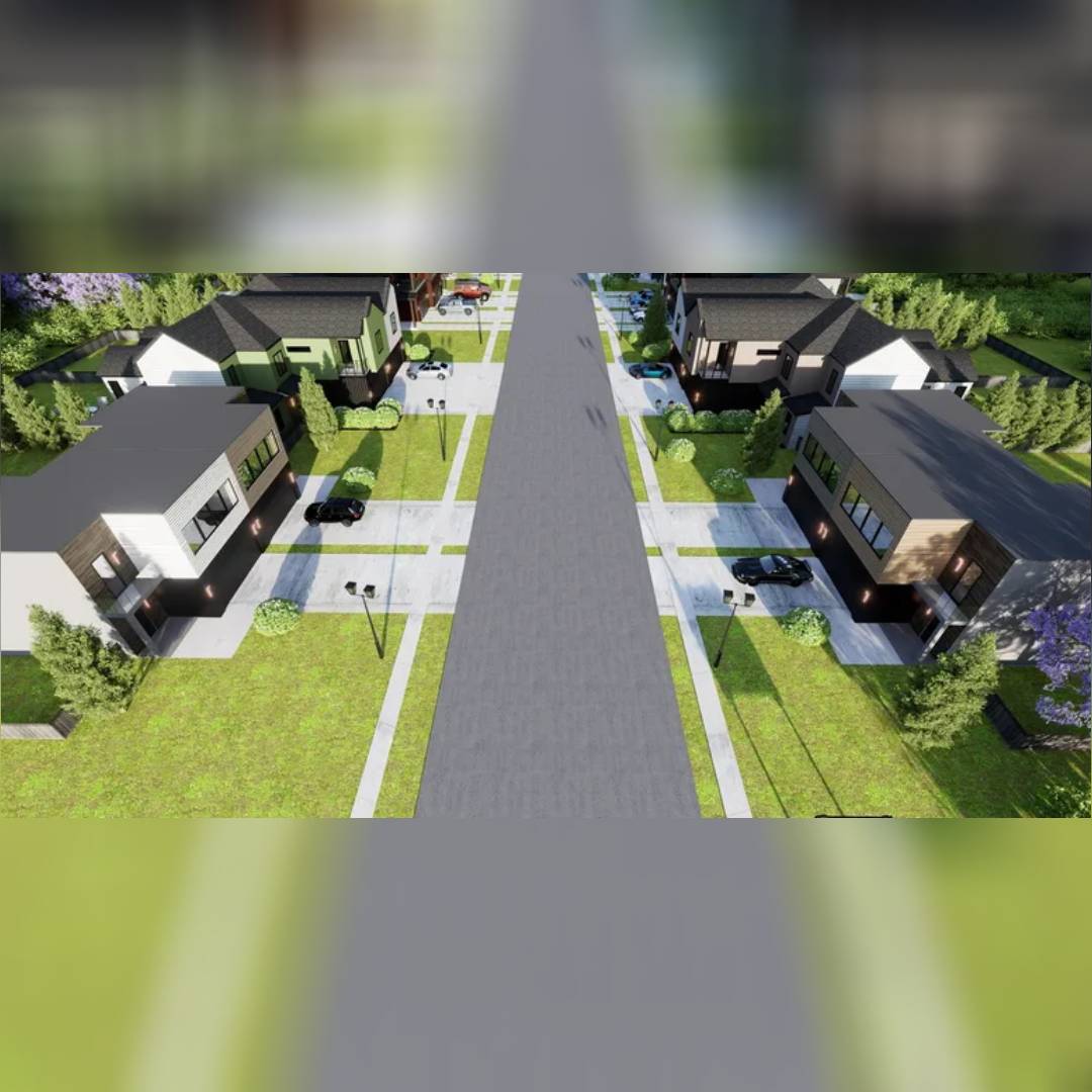 A quiet suburban neighborhood with houses and cars along a tree-lined street.